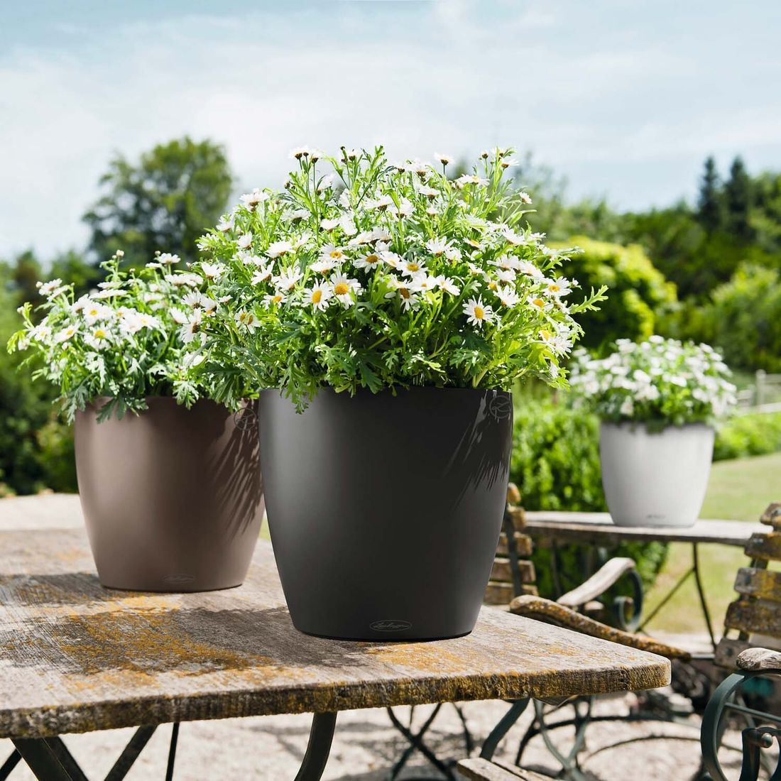 Detaljbilde av vannreservoar i Blomsterkrukke Classico Color 28