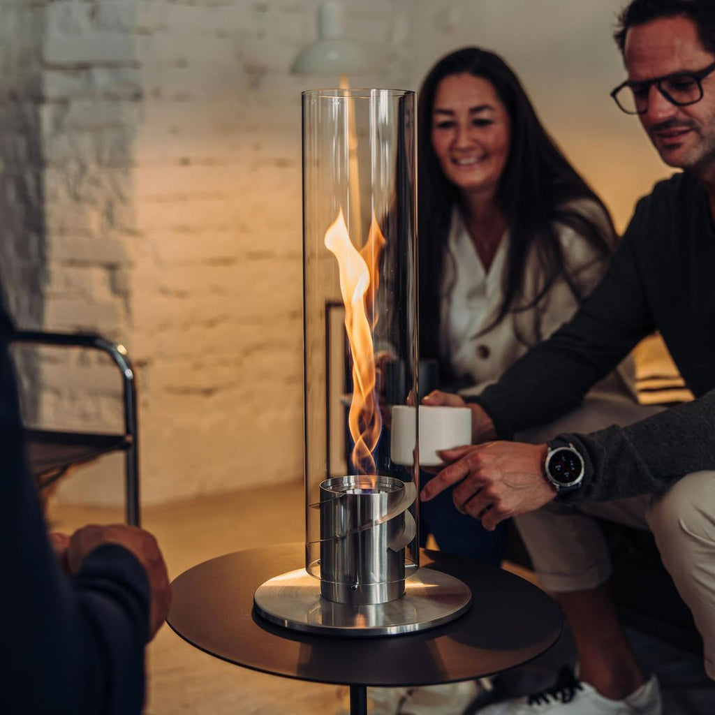 Bordild Spin 1200 rustfritt stål og glass montert på bord