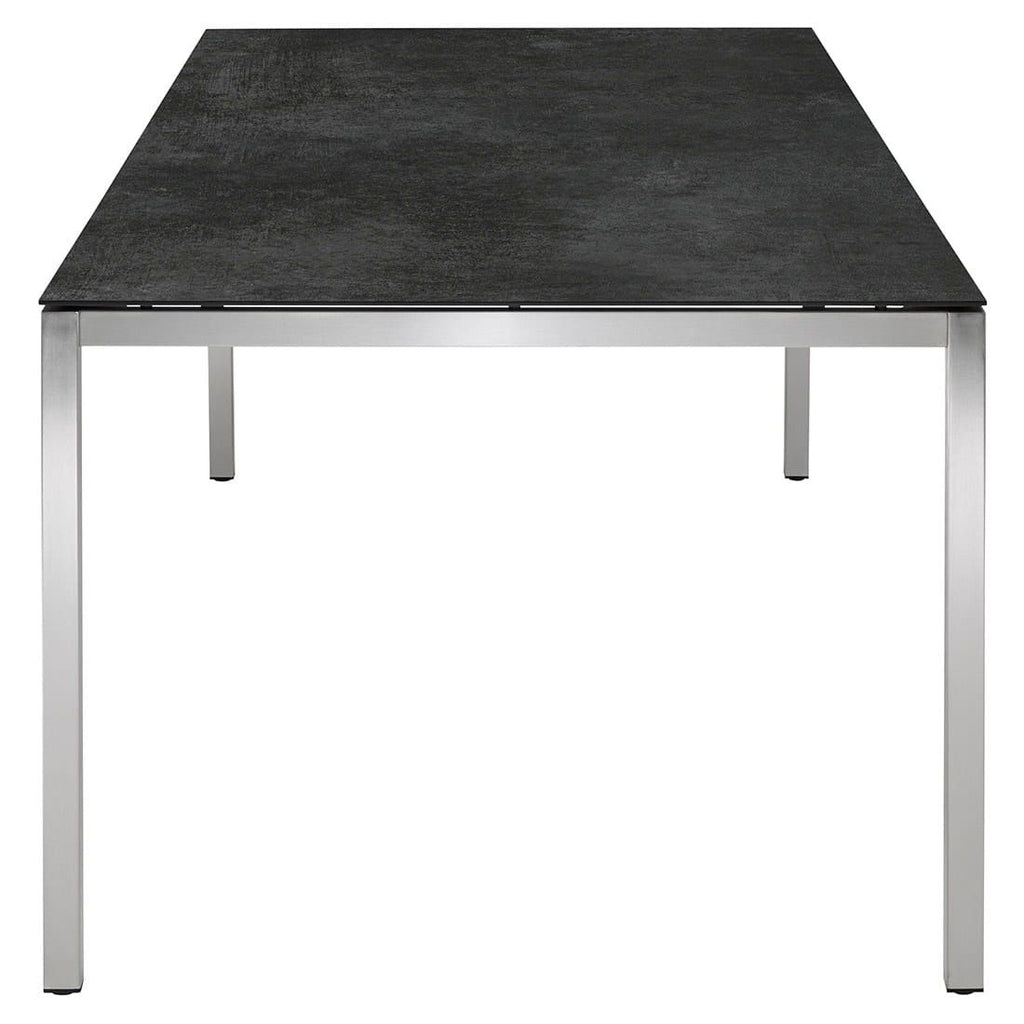 Hagemøbelsett Cardiff 4 plasser rustfritt stål keramikk 140x80 cm montert på terrasse