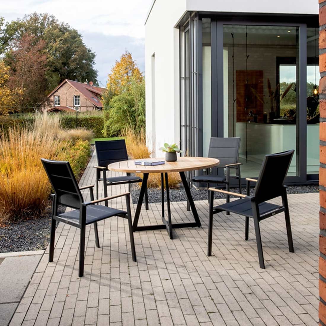 Detalj av bordplate i teak på Hagemøbelsett Revent 4 plasser