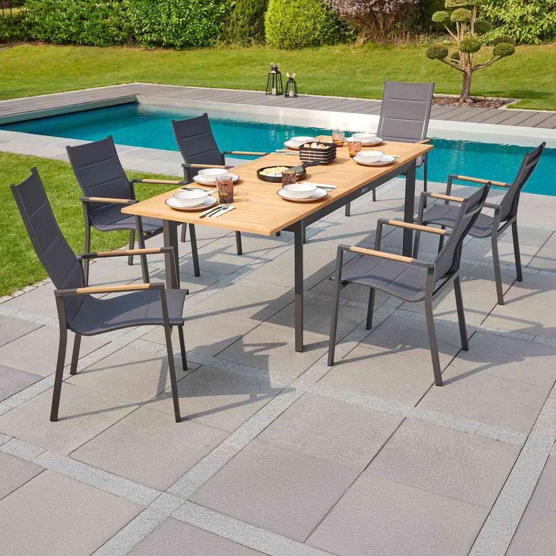 Hagemøbelsett Unicamo 6 plasser stabelstol teak 180/240 cm forfra