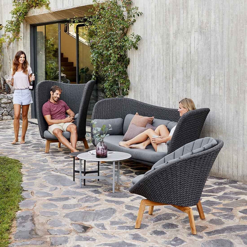 Detalj av outdoorstoff på Hagesofa Peacock Wing teak/tau 248 cm