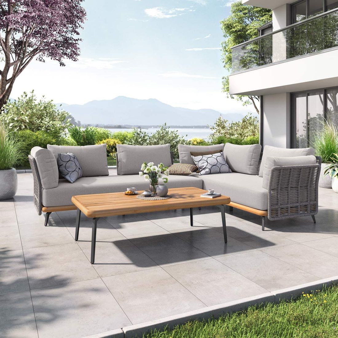 Hjørnesofa ute Ava med loungebord akasie/tau forfra