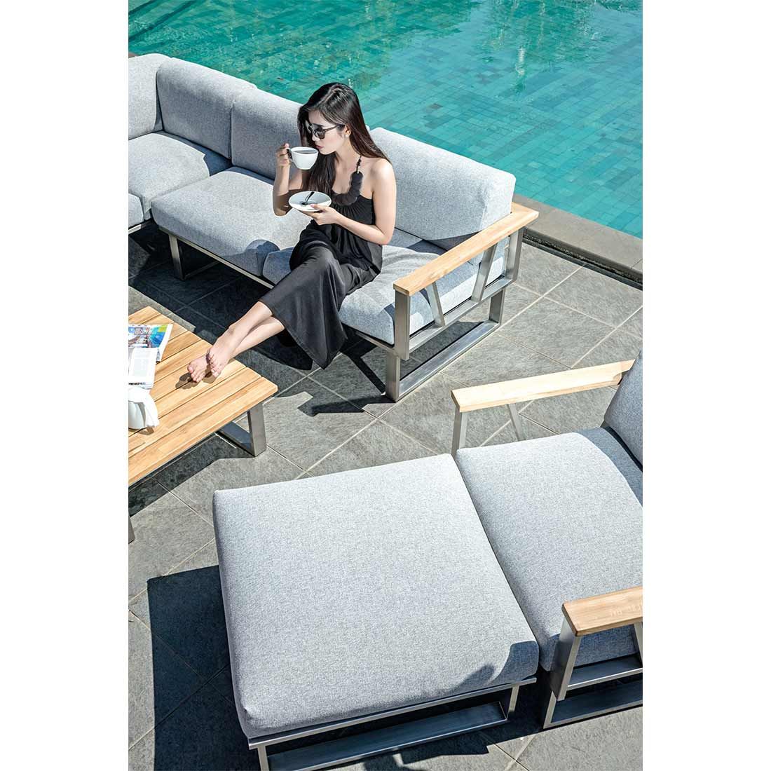 Hjørnesofa ute Belvedere med loungebord rustfritt stål/olefin i moderne hagemiljø