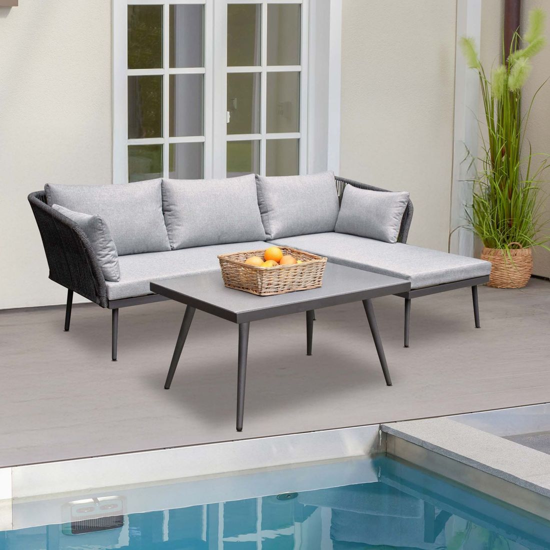 Hjørnesofa ute Sunera med loungebord stål tau fra front