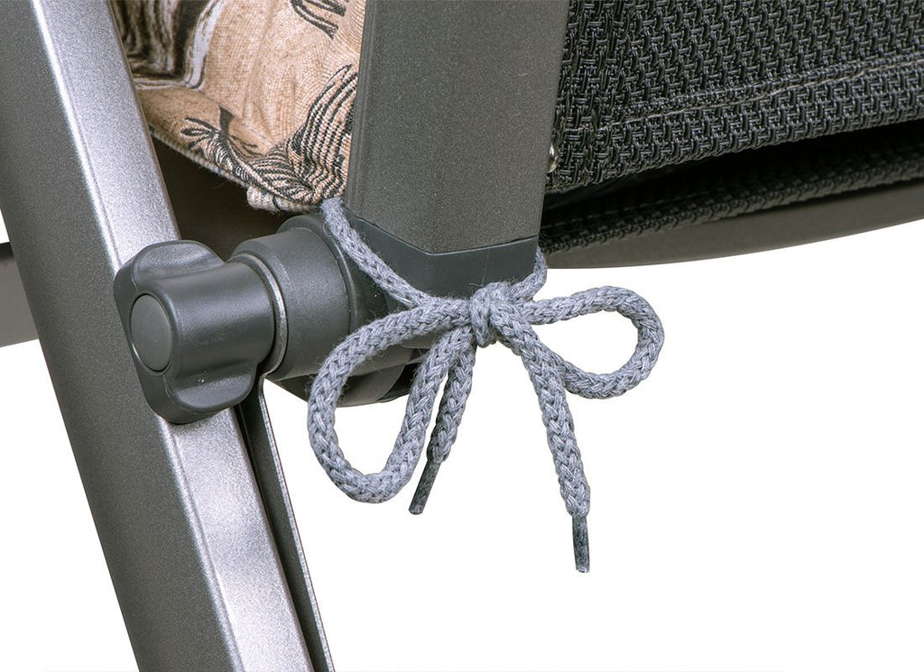 Nærbilde av stoffet på Høyrygg stolpute 50x120 cm brun mønstret