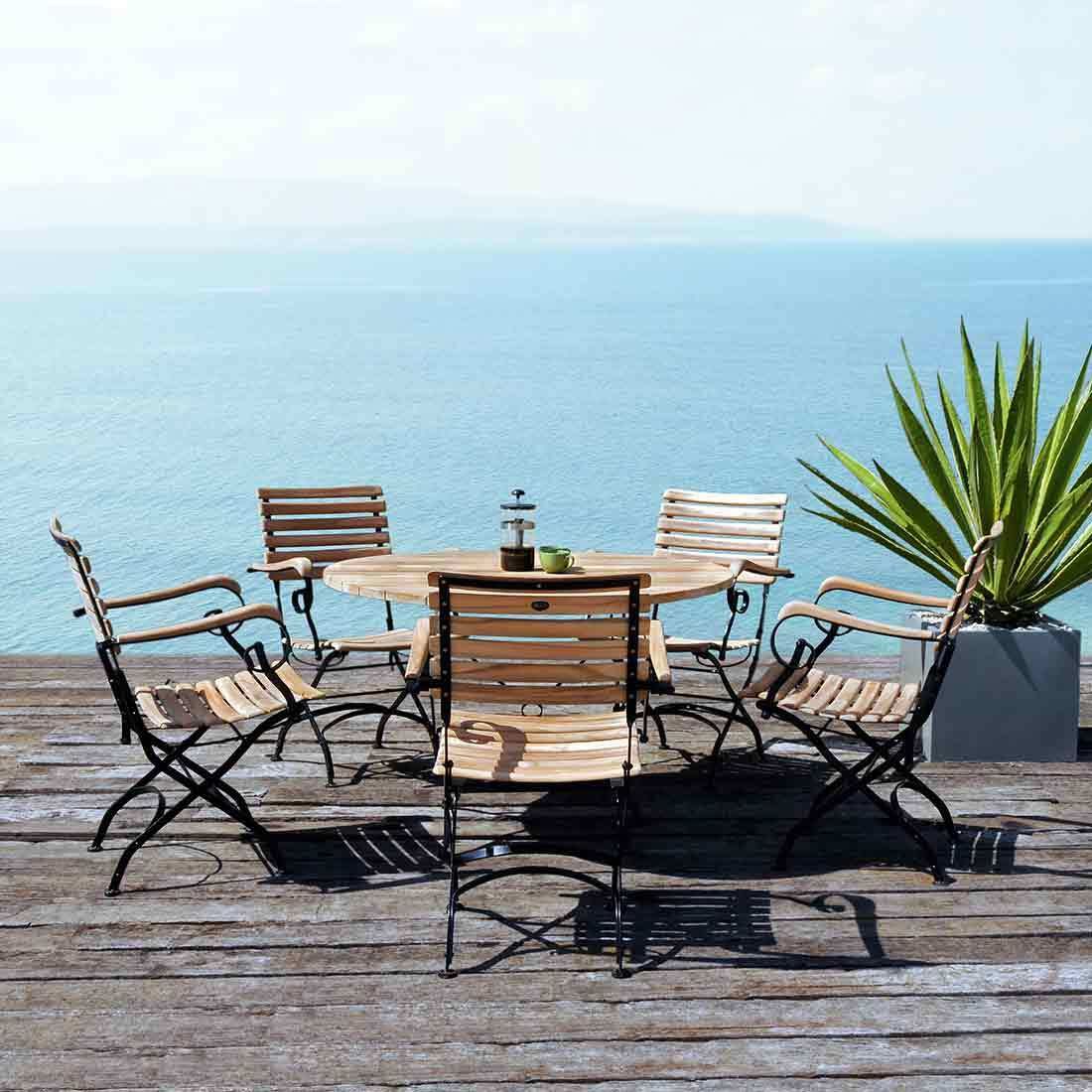 Detalj av teakseteflate på Klappstol ute Florence med armlener stål/teak 60 cm