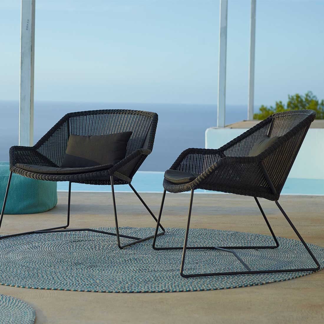 Loungestol Breeze flettverk/stål svart 87x72 cm med puter