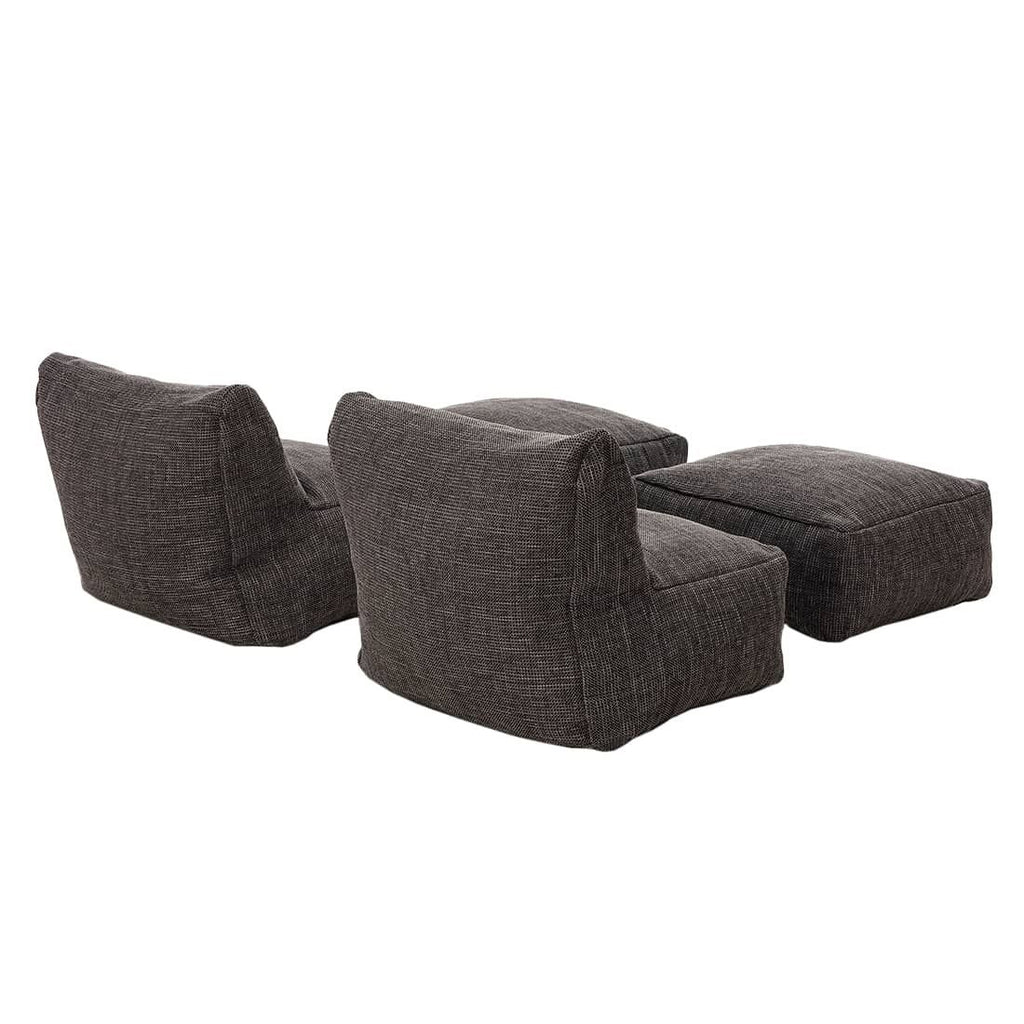 Loungestol med fotskammel Dotty polypropylen - ROOLF Living montert på terrasse