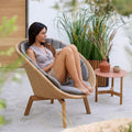Loungestol Peacock resirkulert teak/flettverk 91x93 cm forfra