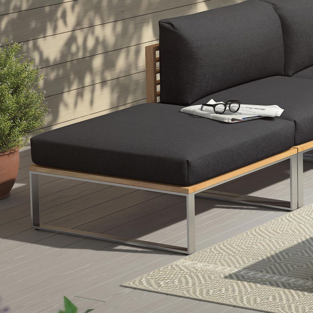 Loungetaburett Sumba rustfritt stål/teak med pute forfra