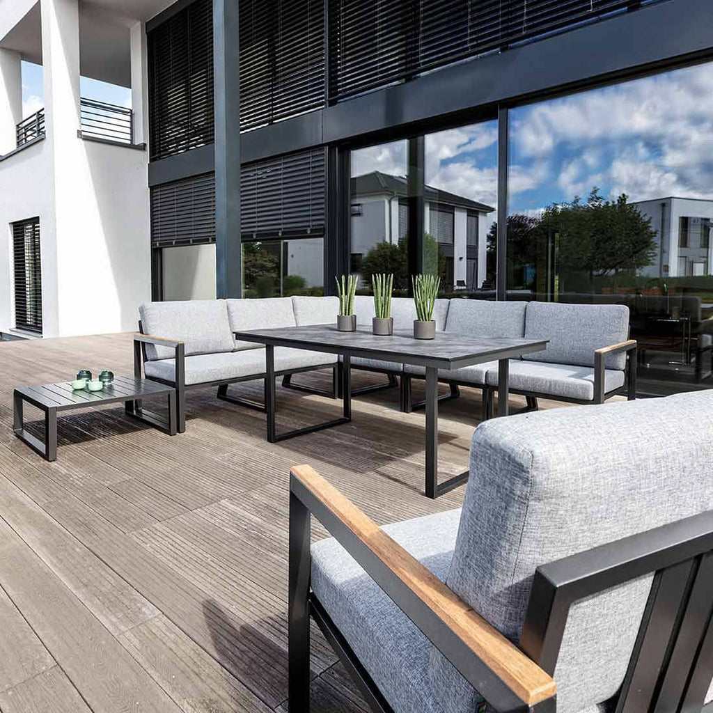 Spise-loungesett Ocean Skid aluminium HPL 160x95 cm montert i hage